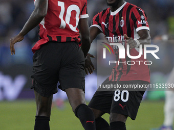 Rafael Leao of AC Milan celebrates after scoring a goal with Yunes Musah of AC Milan during the Serie A match between Lazio and Milan at Sta...