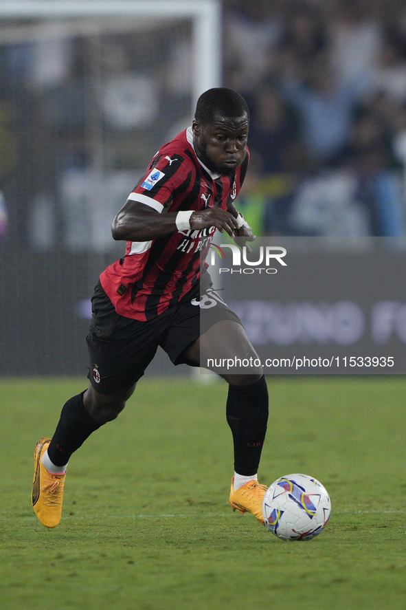 Yunes Musah of AC Milan is in action during the Serie match between Lazio and Milan at Stadio Olimpico in Rome, Italy, on August 31, 2024. 