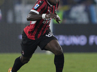 Yunes Musah of AC Milan is in action during the Serie match between Lazio and Milan at Stadio Olimpico in Rome, Italy, on August 31, 2024. (