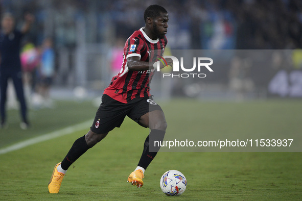 Yunes Musah of AC Milan is in action during the Serie match between Lazio and Milan at Stadio Olimpico in Rome, Italy, on August 31, 2024. 