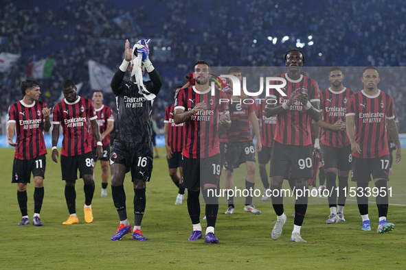 AC Milan players greet the fans at the end of the Serie A match between Lazio and Milan at Stadio Olimpico in Rome, Italy, on August 31, 202...