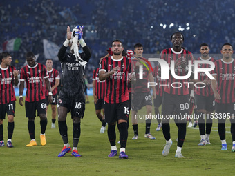 AC Milan players greet the fans at the end of the Serie A match between Lazio and Milan at Stadio Olimpico in Rome, Italy, on August 31, 202...