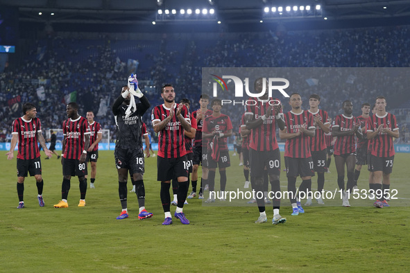 AC Milan players greet the fans at the end of the Serie A match between Lazio and Milan at Stadio Olimpico in Rome, Italy, on August 31, 202...