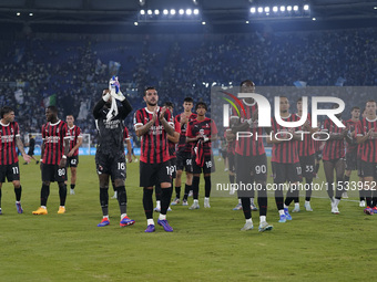 AC Milan players greet the fans at the end of the Serie A match between Lazio and Milan at Stadio Olimpico in Rome, Italy, on August 31, 202...