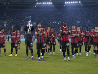 AC Milan players greet the fans at the end of the Serie A match between Lazio and Milan at Stadio Olimpico in Rome, Italy, on August 31, 202...