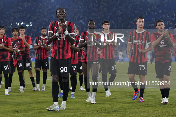 Tammi Abraham of AC Milan greets the fans at the end of the Serie A match between Lazio and Milan at Stadio Olimpico in Rome, Italy, on Augu...