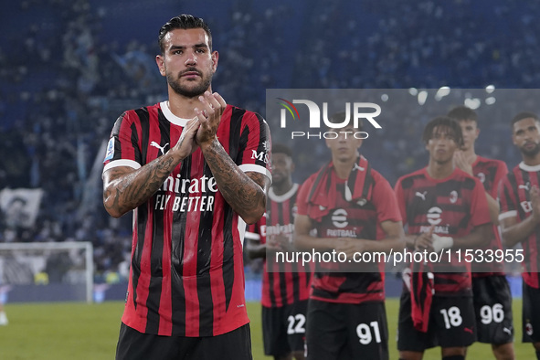 Theo Hernandez of AC Milan greets the fans at the end of the Serie A match between Lazio and Milan at Stadio Olimpico in Rome, Italy, on Aug...