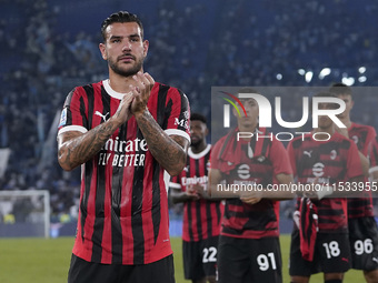 Theo Hernandez of AC Milan greets the fans at the end of the Serie A match between Lazio and Milan at Stadio Olimpico in Rome, Italy, on Aug...