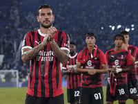 Theo Hernandez of AC Milan greets the fans at the end of the Serie A match between Lazio and Milan at Stadio Olimpico in Rome, Italy, on Aug...