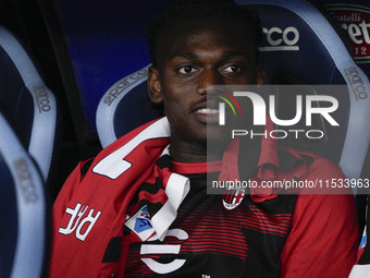 Rafael Leao of AC Milan looks on from the bench during the Serie A match between Lazio and Milan at Stadio Olimpico in Rome, Italy, on Augus...