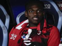 Rafael Leao of AC Milan looks on from the bench during the Serie A match between Lazio and Milan at Stadio Olimpico in Rome, Italy, on Augus...