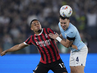 Noah Okafor of AC Milan competes for the ball with Patric of S.S. Lazio during the Serie A match between Lazio and Milan at Stadio Olimpico...