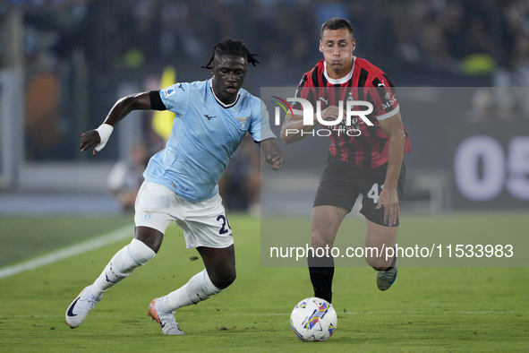 Loum Tchaouna of S.S. Lazio competes for the ball with Filippo Terracciano of AC Milan during the Serie A match between Lazio and Milan at S...