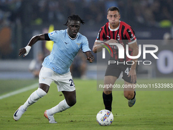 Loum Tchaouna of S.S. Lazio competes for the ball with Filippo Terracciano of AC Milan during the Serie A match between Lazio and Milan at S...