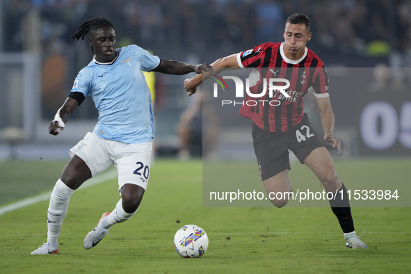 Loum Tchaouna of S.S. Lazio competes for the ball with Filippo Terracciano of AC Milan during the Serie A match between Lazio and Milan at S...