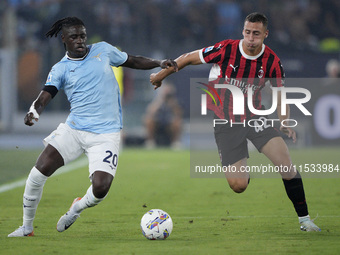 Loum Tchaouna of S.S. Lazio competes for the ball with Filippo Terracciano of AC Milan during the Serie A match between Lazio and Milan at S...