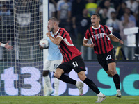 Strahinja Pavlovic of AC Milan celebrates after scoring a goal during the Serie A match between Lazio and Milan at Stadio Olimpico in Rome,...