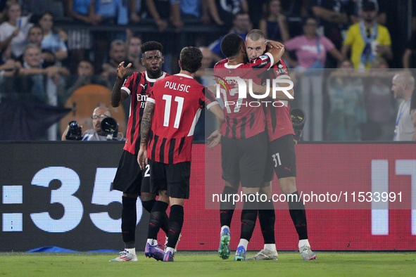 Strahinja Pavlovic of AC Milan celebrates after scoring a goal during the Serie A match between Lazio and Milan at Stadio Olimpico in Rome,...