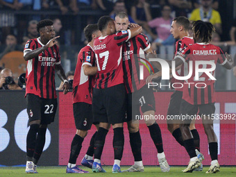 Strahinja Pavlovic of AC Milan celebrates after scoring a goal with his teammates during the Serie A match between Lazio and Milan at Stadio...