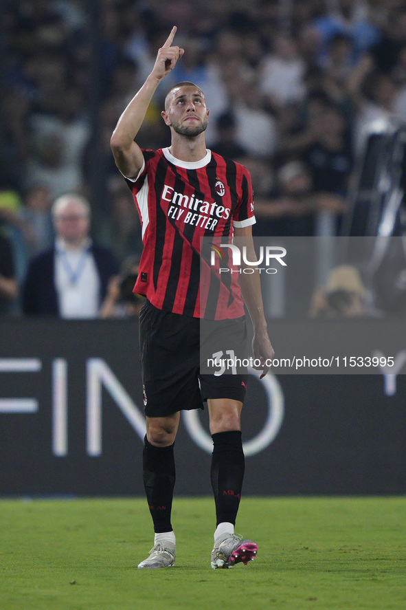 Strahinja Pavlovic of AC Milan celebrates after scoring a goal during the Serie A match between Lazio and Milan at Stadio Olimpico in Rome,...