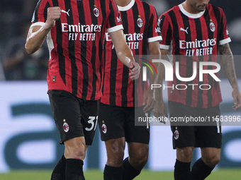 Strahinja Pavlovic of AC Milan celebrates after scoring a goal during the Serie A match between Lazio and Milan at Stadio Olimpico in Rome,...