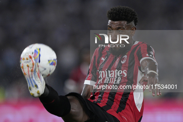 Emerson Royal of AC Milan is in action during the Serie match between Lazio and Milan at Stadio Olimpico in Rome, Italy, on August 31, 2024....