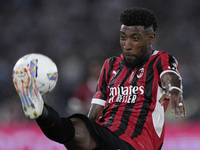 Emerson Royal of AC Milan is in action during the Serie match between Lazio and Milan at Stadio Olimpico in Rome, Italy, on August 31, 2024....