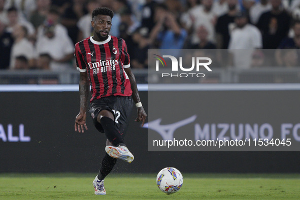 Emerson Royal of AC Milan is in action during the Serie match between Lazio and Milan at Stadio Olimpico in Rome, Italy, on August 31, 2024....