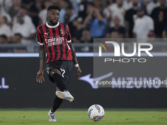 Emerson Royal of AC Milan is in action during the Serie match between Lazio and Milan at Stadio Olimpico in Rome, Italy, on August 31, 2024....