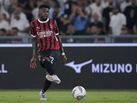 Emerson Royal of AC Milan is in action during the Serie match between Lazio and Milan at Stadio Olimpico in Rome, Italy, on August 31, 2024....