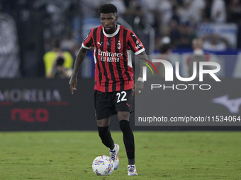 Emerson Royal of AC Milan is in action during the Serie match between Lazio and Milan at Stadio Olimpico in Rome, Italy, on August 31, 2024....