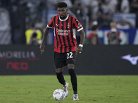 Emerson Royal of AC Milan is in action during the Serie match between Lazio and Milan at Stadio Olimpico in Rome, Italy, on August 31, 2024....