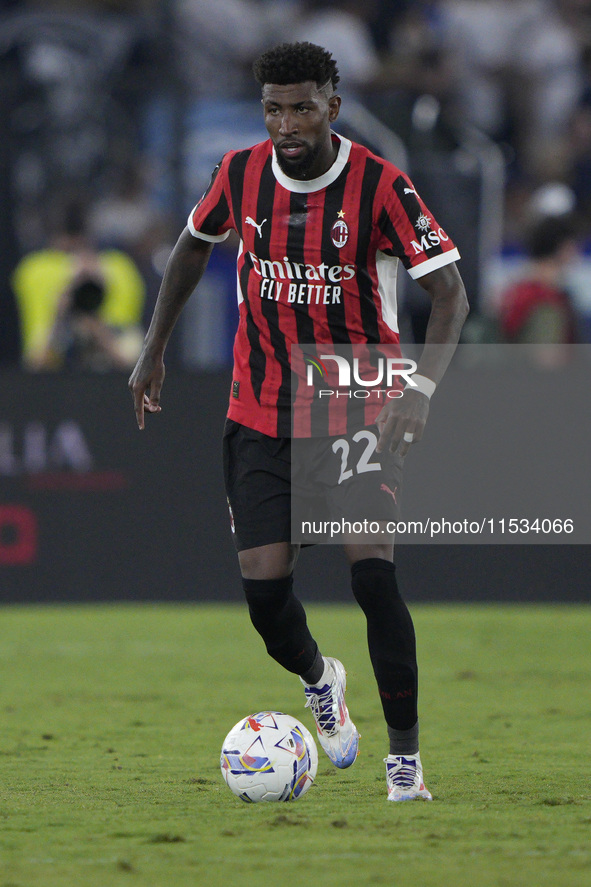 Emerson Royal of AC Milan is in action during the Serie match between Lazio and Milan at Stadio Olimpico in Rome, Italy, on August 31, 2024....