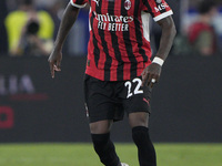 Emerson Royal of AC Milan is in action during the Serie match between Lazio and Milan at Stadio Olimpico in Rome, Italy, on August 31, 2024....