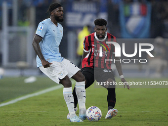 Nuno Albertino Varela Tavares of S.S. Lazio competes for the ball with Emerson Royal of AC Milan during the Serie match between Lazio and Mi...