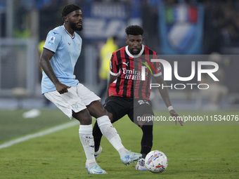 Nuno Albertino Varela Tavares of S.S. Lazio competes for the ball with Emerson Royal of AC Milan during the Serie match between Lazio and Mi...