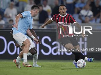 Noah Okafor of AC Milan is in action during the Serie A match between Lazio and Milan at Stadio Olimpico in Rome, Italy, on August 31, 2024....