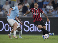 Noah Okafor of AC Milan is in action during the Serie A match between Lazio and Milan at Stadio Olimpico in Rome, Italy, on August 31, 2024....