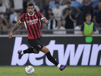 Theo Hernandez of AC Milan is in action during the Serie A match between Lazio and Milan at Stadio Olimpico in Rome, Italy, on August 31, 20...