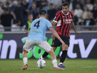 Theo Hernandez of AC Milan is in action during the Serie A match between Lazio and Milan at Stadio Olimpico in Rome, Italy, on August 31, 20...