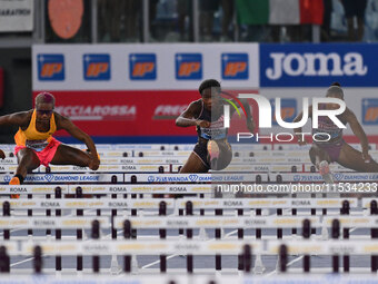 Devynne Charlton (BAH), Cyrena Samba-Mayela (FRA), and Janieve Russell (JAM) compete in the 100m Hurdles Women and the 400m Hurdles Women du...