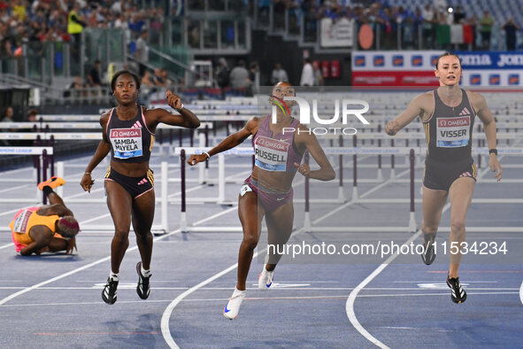 Cyrena SAMBA-MAYELA (FRA), Janieve RUSSELL (JAM), and Nadine VISSER (NED) compete in the 100m Hurdles Women and 400m Hurdles Women during th...