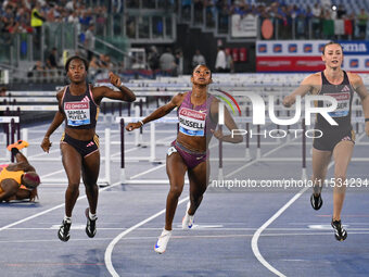 Cyrena SAMBA-MAYELA (FRA), Janieve RUSSELL (JAM), and Nadine VISSER (NED) compete in the 100m Hurdles Women and 400m Hurdles Women during th...