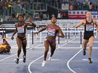 Cyrena SAMBA-MAYELA (FRA), Janieve RUSSELL (JAM), and Nadine VISSER (NED) compete in the 100m Hurdles Women and 400m Hurdles Women during th...