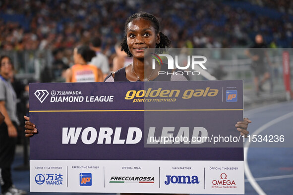 Ackera Nugent (JAM) competes in the 100m hurdles for women during the IAAF Wanda Diamond League: Golden Gala Pietro Mennea at Olympic Stadiu...