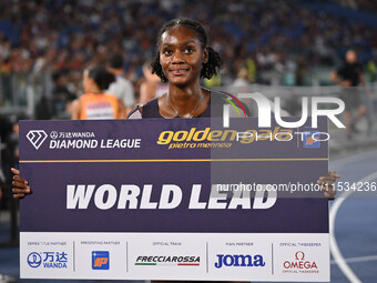 Ackera Nugent (JAM) competes in the 100m hurdles for women during the IAAF Wanda Diamond League: Golden Gala Pietro Mennea at Olympic Stadiu...