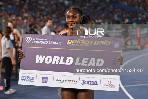 Ackera Nugent (JAM) competes in the 100m hurdles for women during the IAAF Wanda Diamond League: Golden Gala Pietro Mennea at Olympic Stadiu...