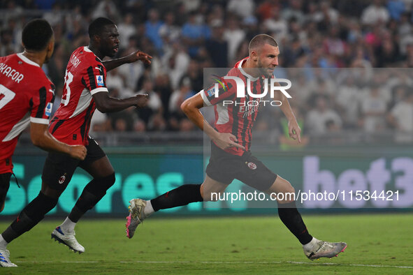 Strahinja Pavlovic of A.C. Milan celebrates after scoring the goal of 0-1 during the 3rd day of the Serie A Championship between S.S. Lazio...