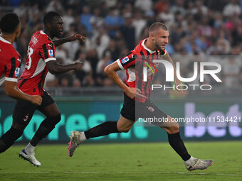 Strahinja Pavlovic of A.C. Milan celebrates after scoring the goal of 0-1 during the 3rd day of the Serie A Championship between S.S. Lazio...