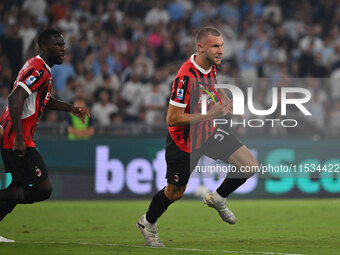 Strahinja Pavlovic of A.C. Milan celebrates after scoring the goal of 0-1 during the 3rd day of the Serie A Championship between S.S. Lazio...